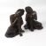 Image 1 of Wood Effect Small Thai Buddha Figurines - Head on Knee - Pair